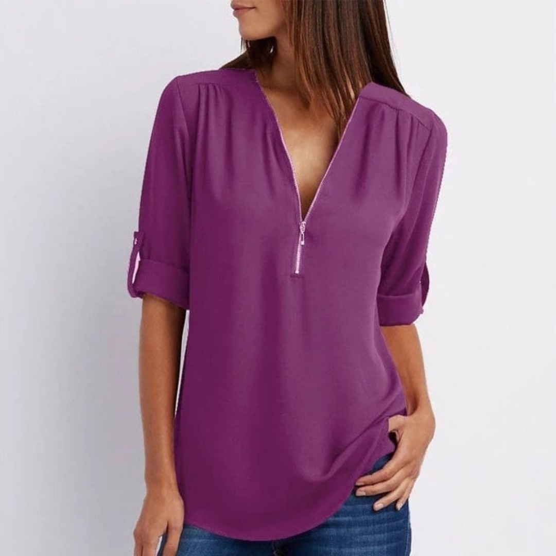 Chic women's V-neck blouse, versatile for office fashion or smart casual events, with comfortable roll-up sleeves.