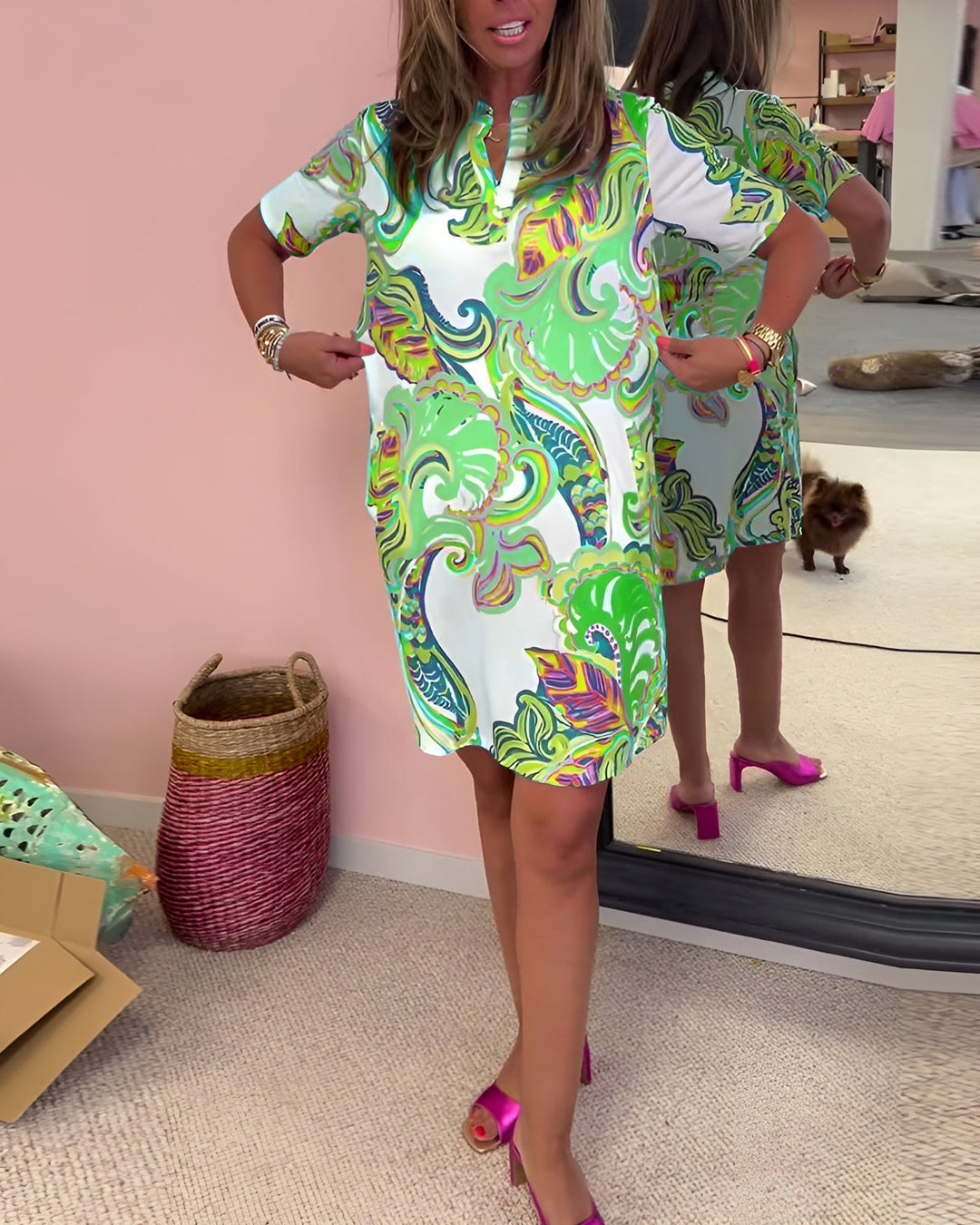 Stylish women's V-neck printed dress featuring a flattering drape & tummy control for a chic look.