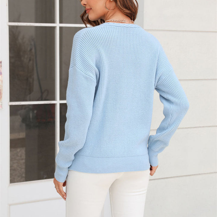 Oversized women's V-neck loose fit sweater. Relaxed knit top for ultimate comfort & casual style.