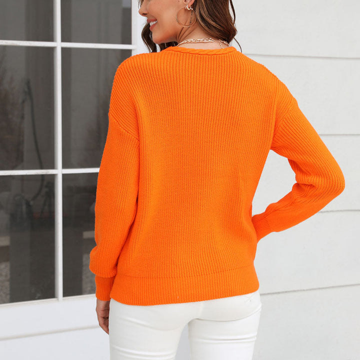 Women's breathable V-neck loose fit sweater. Comfortable knit top for all-day autumn wear.