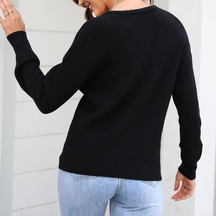 High-quality women's V-neck loose fit sweater. Durable long sleeve knit top for lasting style.