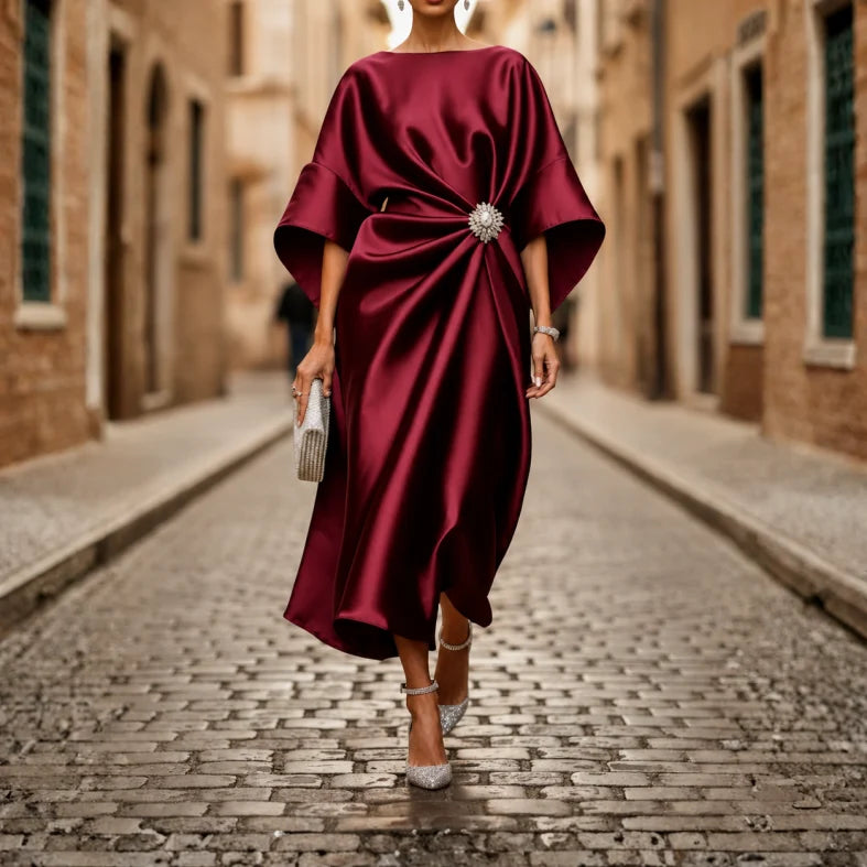 Elegant women's V-neck midi dress, featuring comfortable elbow sleeves and a flattering flared skirt.