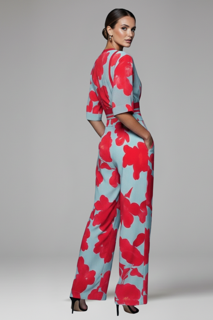 Stylish women's long V-neck printed maxi dress with flutter sleeves & wrap waist, perfect for summer events.