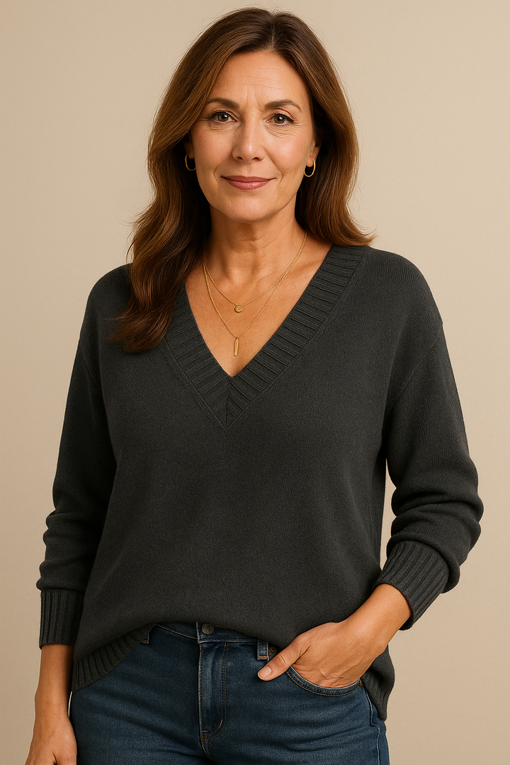 Cozy women's long sleeve V neck sweater. Ribbed knit, relaxed fit, ideal for fall/winter style.