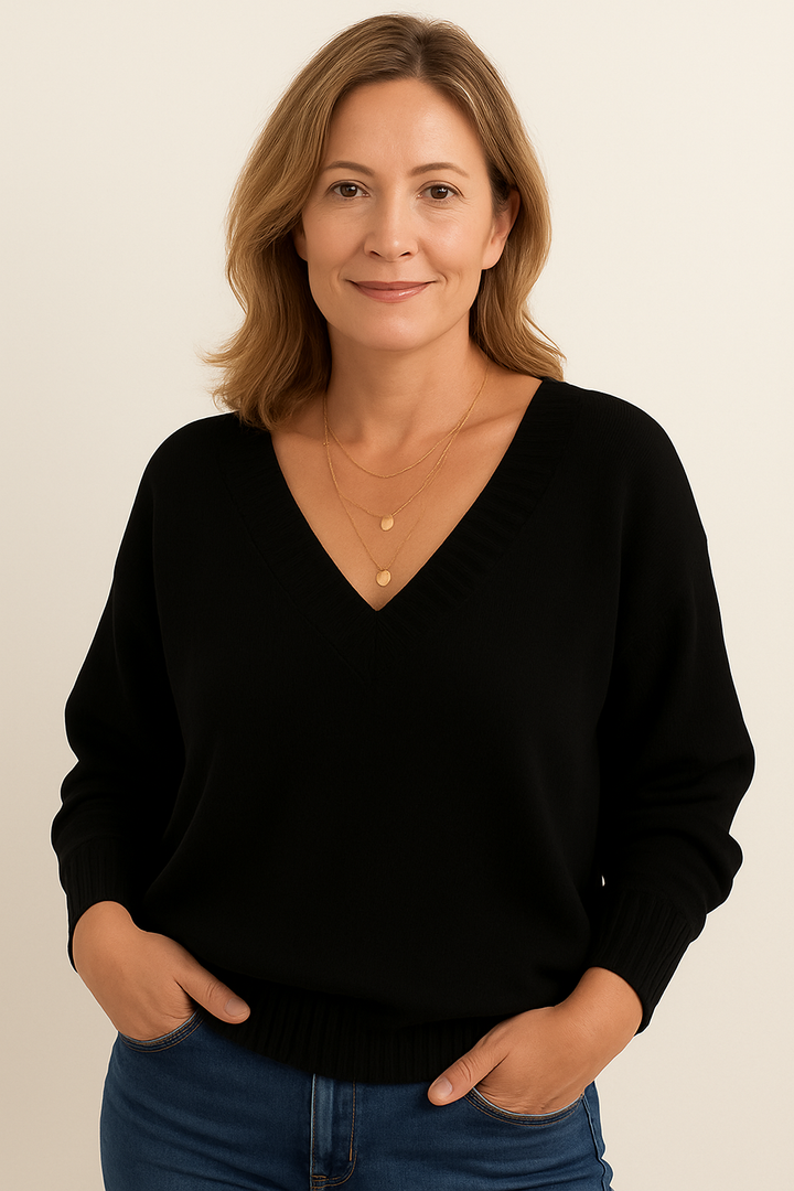 Women's relaxed fit V neck ribbed sweater. Long sleeve, comfortable for casual fall and winter style.
