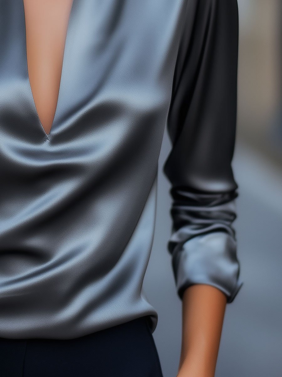 Model wearing a versatile women's satin V-neck blouse, showcasing its comfortable fit and stylish spring summer design.