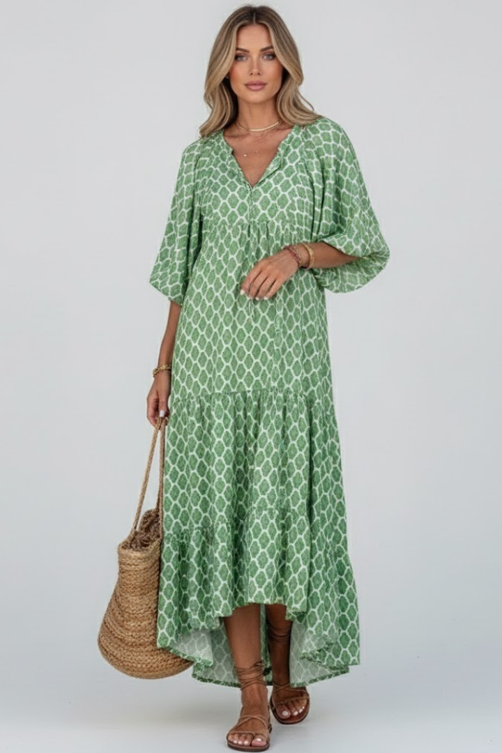 Flowy V-neck maxi dress for women, perfect for relaxed casual style and summer comfort. Features short sleeves.