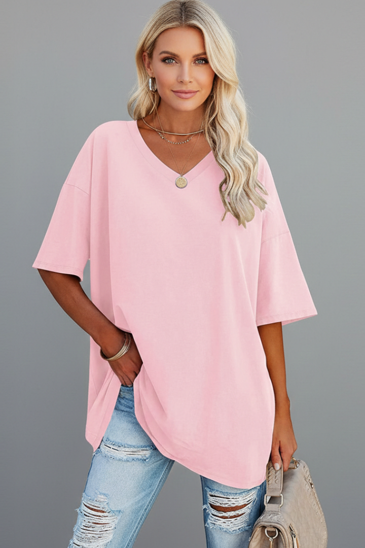 Side view of women's loose fit V-neck t-shirt, short sleeves, a comfortable casual top.