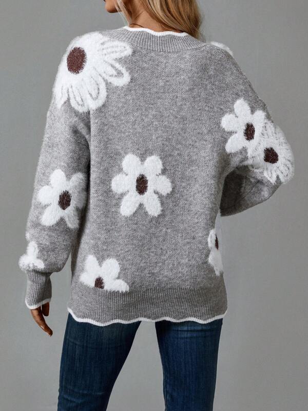 Relaxed fit women's V-neck floral sweater with dropped shoulders & long sleeves for everyday style.