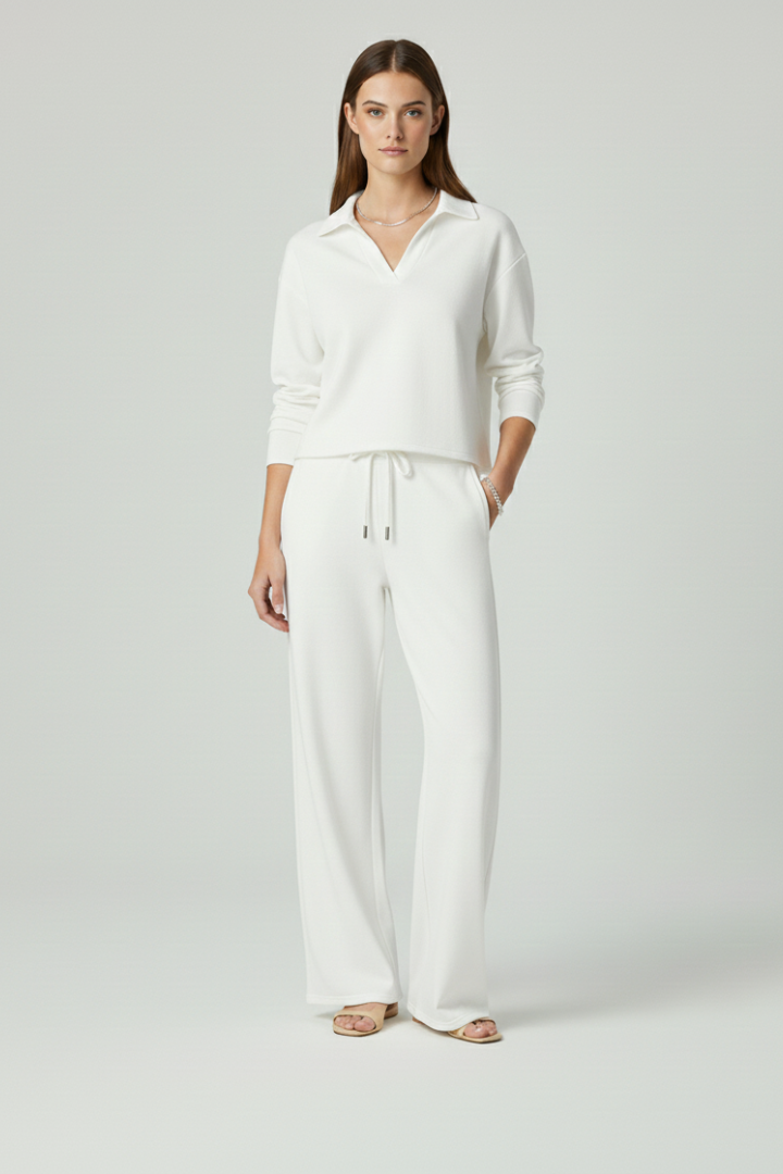 Women's V-neck two-piece set for comfort, featuring a stylish top and flowing wide-leg trousers for casual chic.