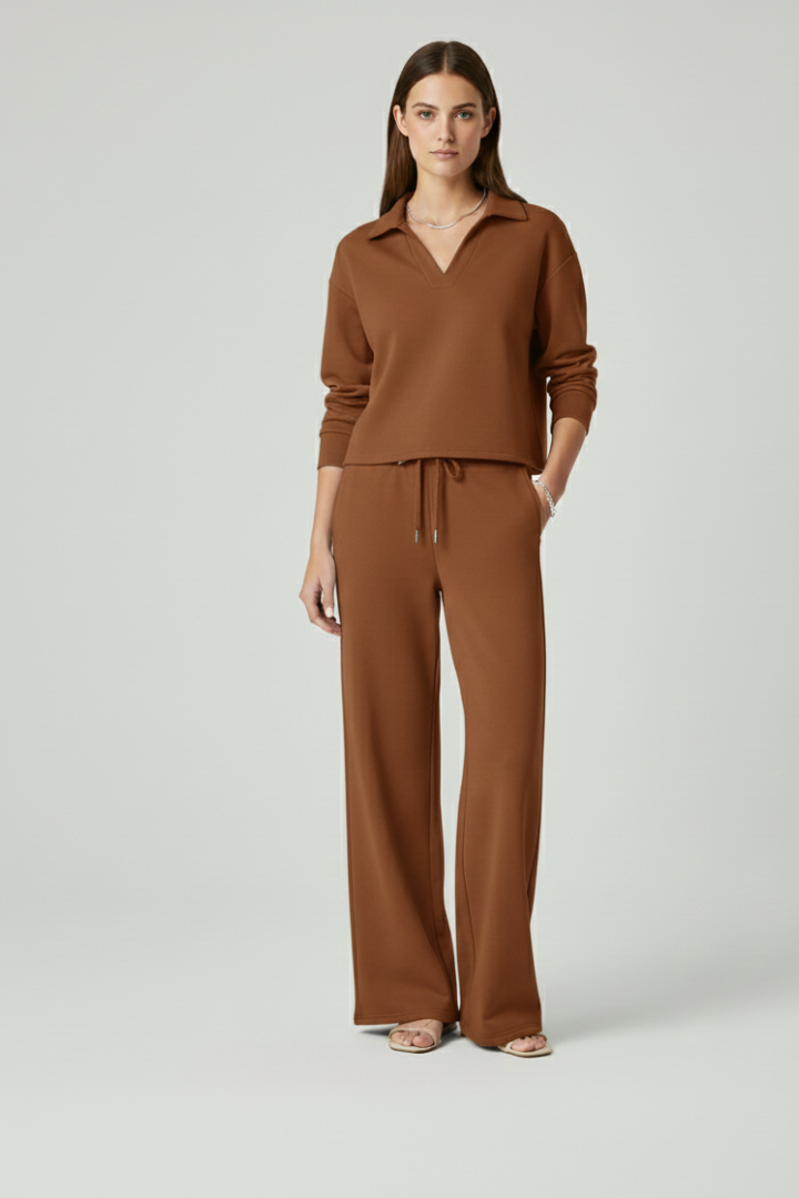 Versatile women's matching set: V-neck top and wide-leg trousers, designed for comfort and everyday fashion.