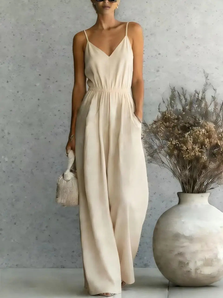 Chic women's V-neck wide leg jumpsuit, a versatile one-piece for casual wear, summer outfits, or vacation style.