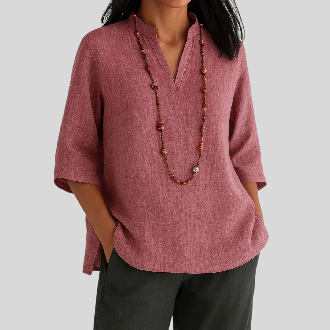 Sophisticated women's V-notch top with three-quarter sleeves. Flowy fit, comfortable & elegant for any occasion.
