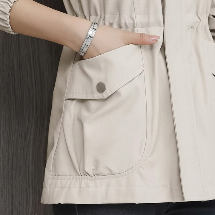 Chic women's transitional jacket with a stand collar and elegant flora design for versatile everyday wear.