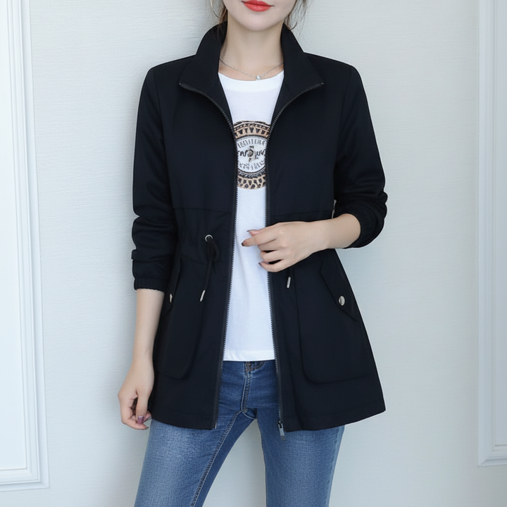 Elegant women's spring/autumn jacket with a vibrant flora pattern, perfect for a stylish layering look.
