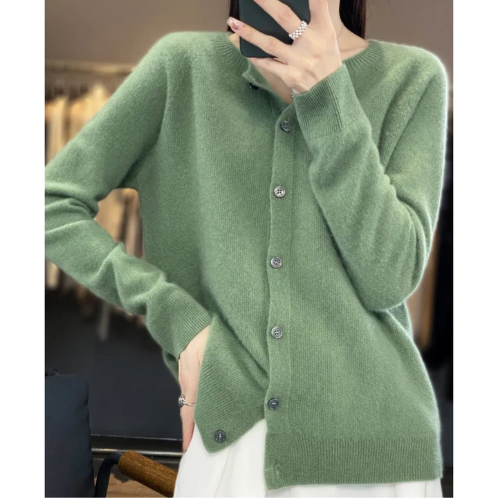 Cozy women's O-neck button-front cardigan. Soft knitwear, long sleeve, great for comfortable layering.