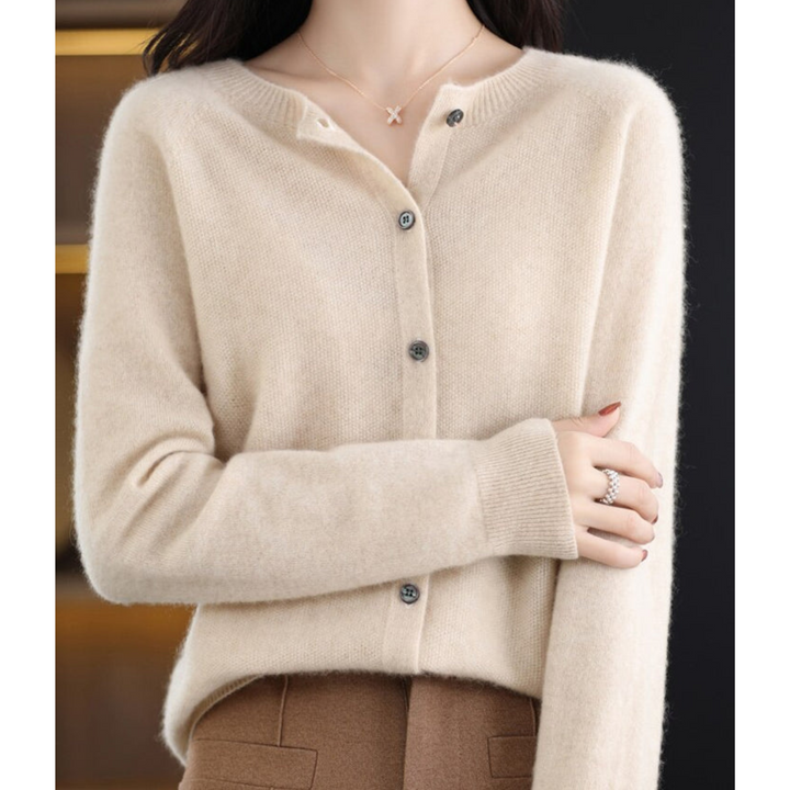 Chic women's O-neck cardigan with button front. Versatile long sleeve knit for adaptable office & casual looks.