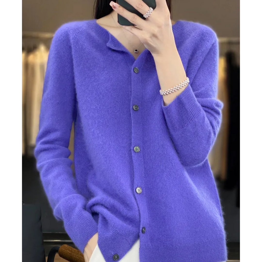 Soft knit women's long sleeve O-neck cardigan, button-front design. Ideal comfortable layering piece.