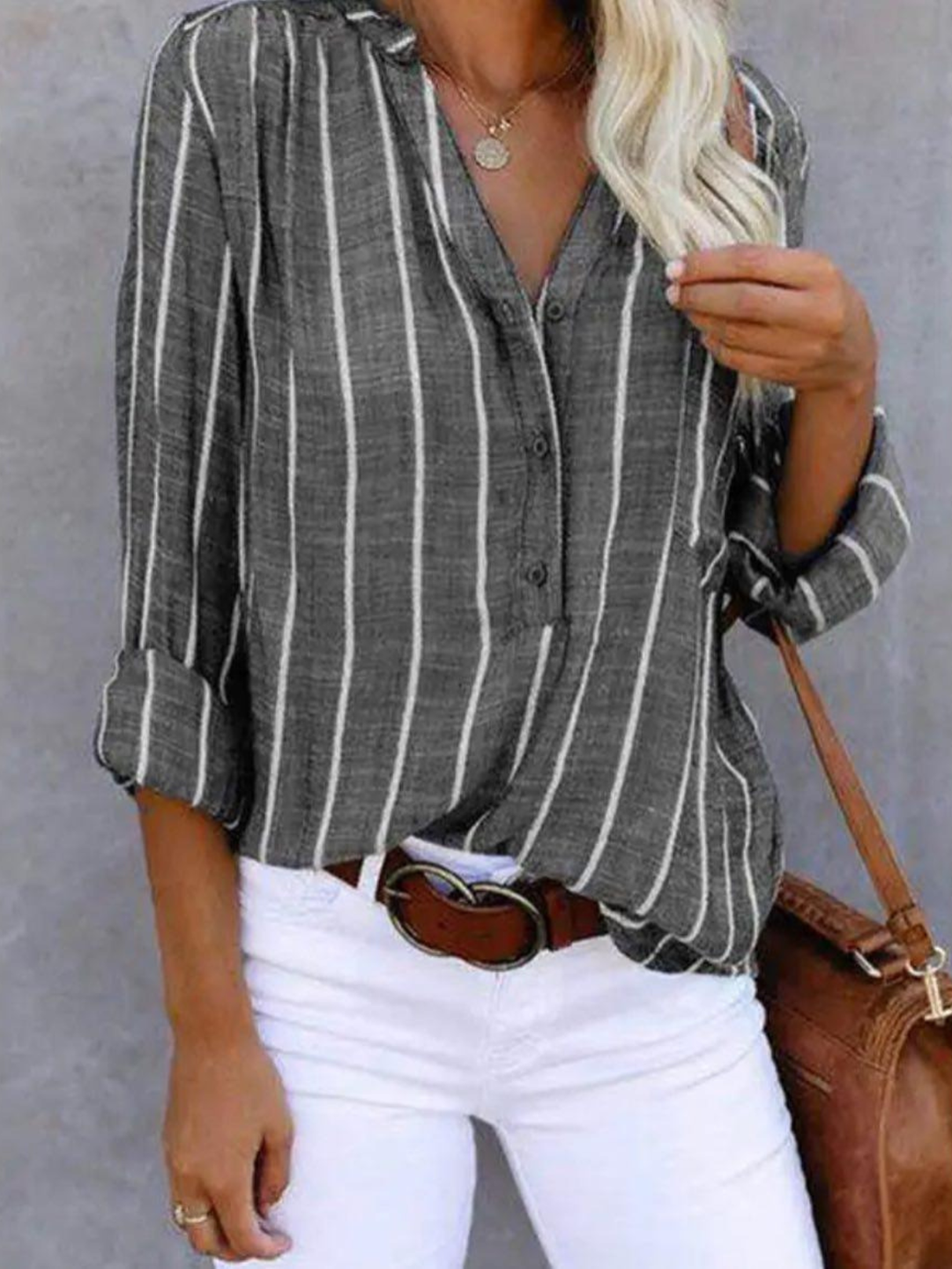 Women's vertical stripe blouse, long sleeve, V-neck, button-front. Casual & chic everyday wear.