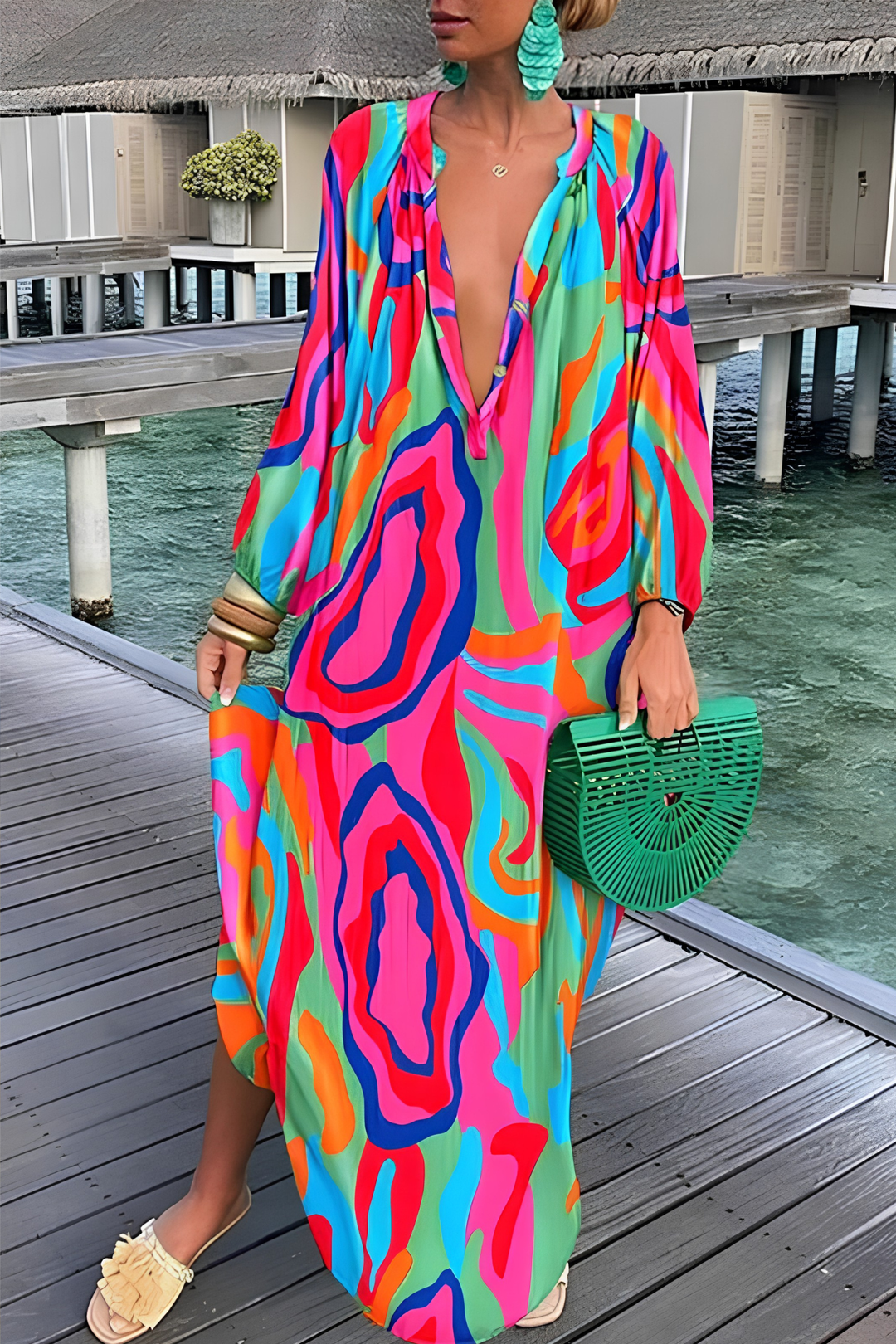 Elegant women's abstract print kaftan maxi dress featuring a V-neck and relaxed, flowing summer fit.