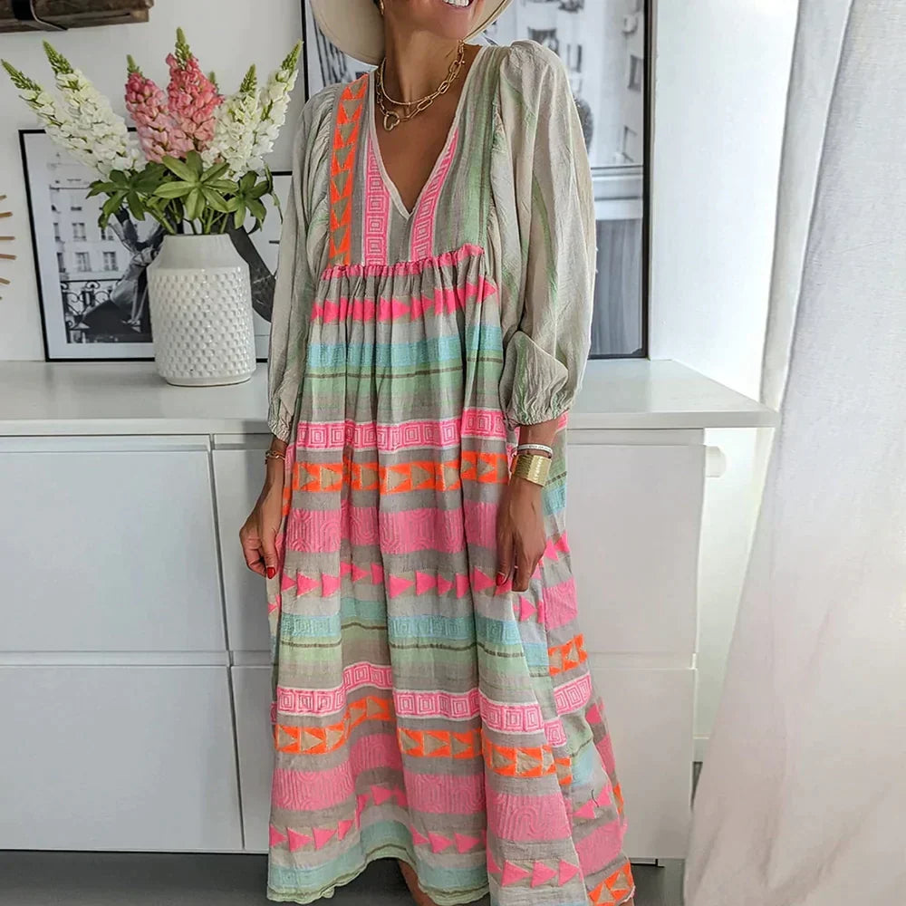 Colorful gradient maxi dress for women, with a flowing, vibrant summer style. Elegant and perfect for parties.