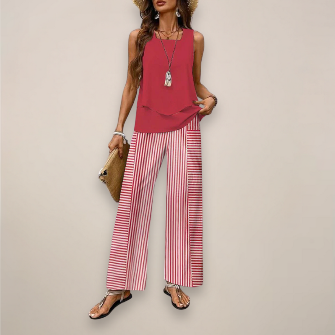 Full shot of a model wearing a comfortable women's printed wide-leg two-piece set, ideal for casual outings.