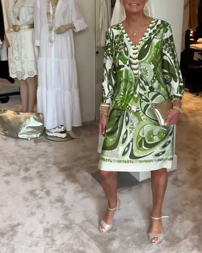 Easy-to-wear women's sunburst printed tunic dress, combining comfort with a chic boho aesthetic.