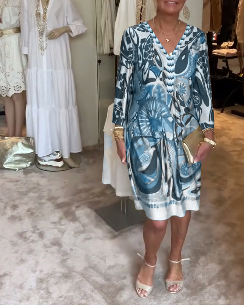 Retro fashion inspired women's sunburst tunic dress, a vibrant choice for summer parties and events.
