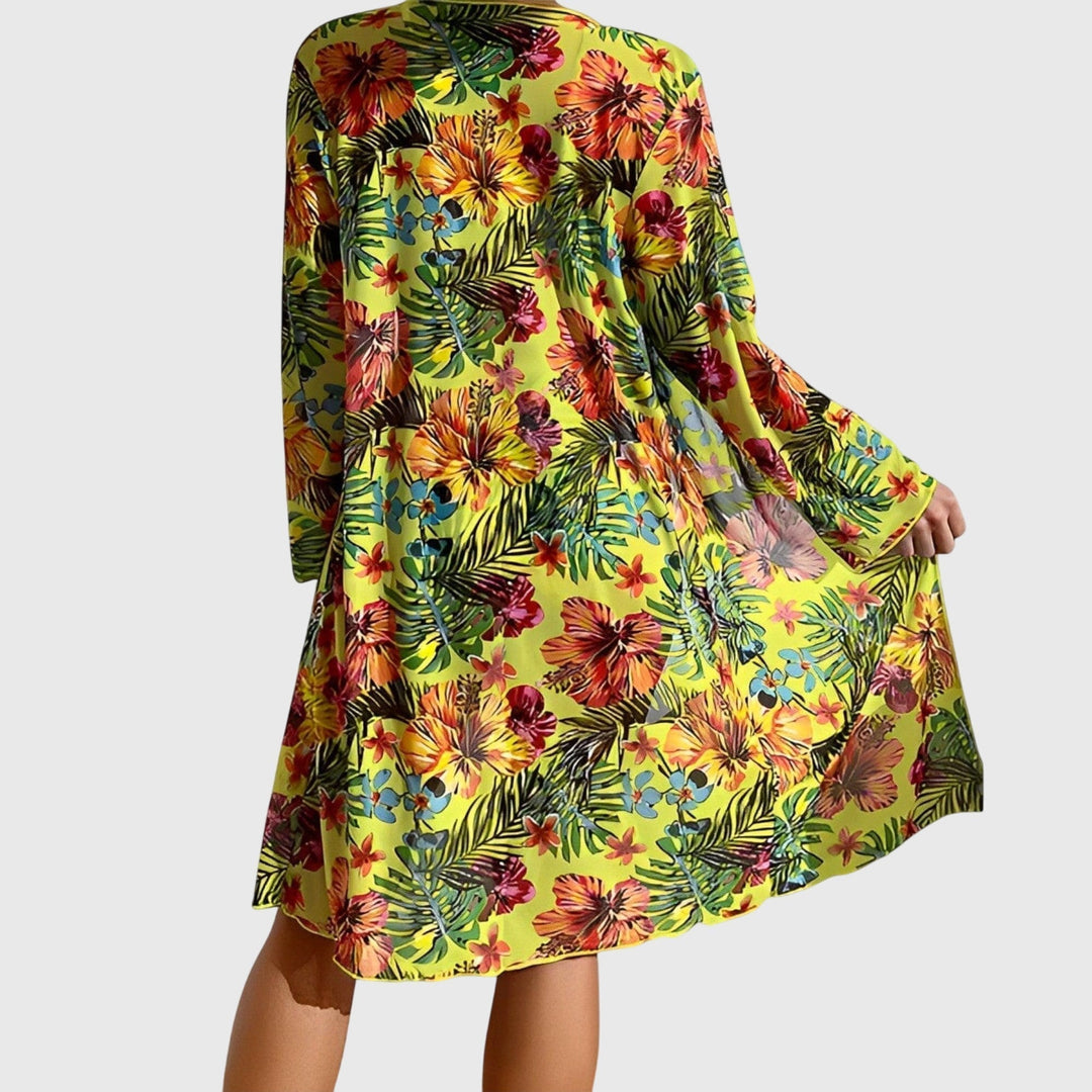Vibrant tropical print bikini for women. Two-piece swimsuit with floral patterns, perfect for summer beach fun.