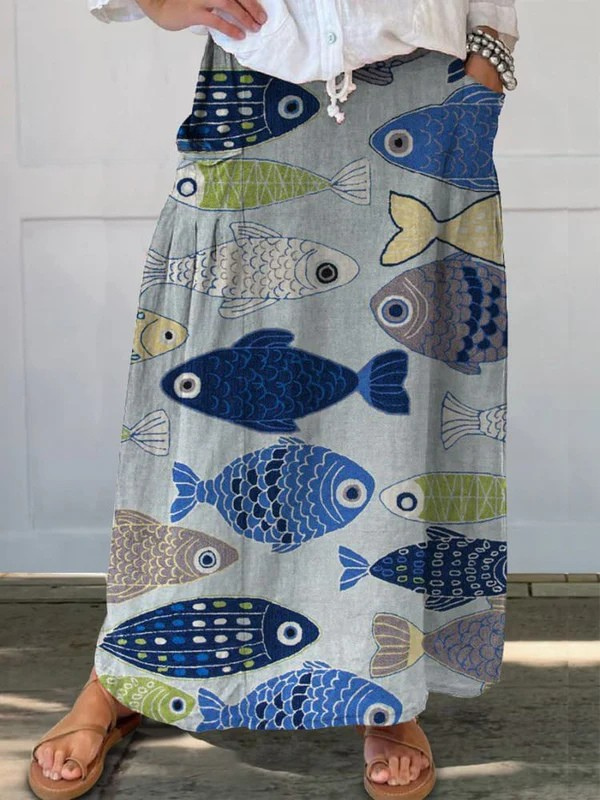 Women's vintage A-line midi skirt with lovely fish art print, pockets, and elastic waist for casual summer style.
