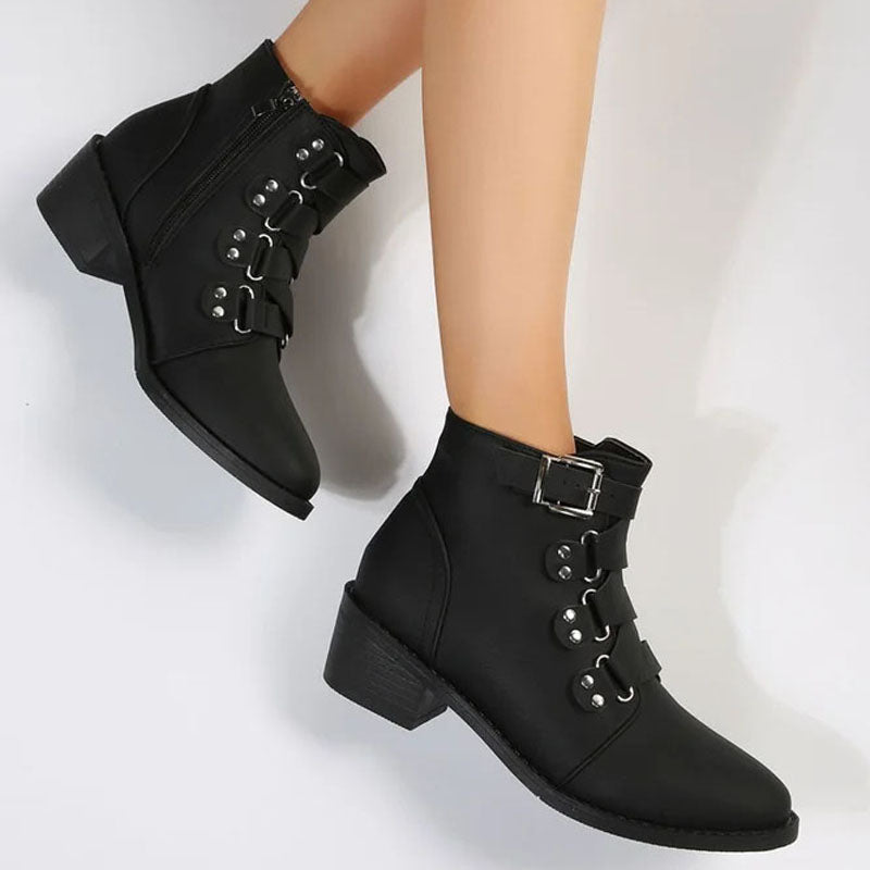 Chic dark brown women's ankle boots with a stable block heel. Retro fashion footwear.