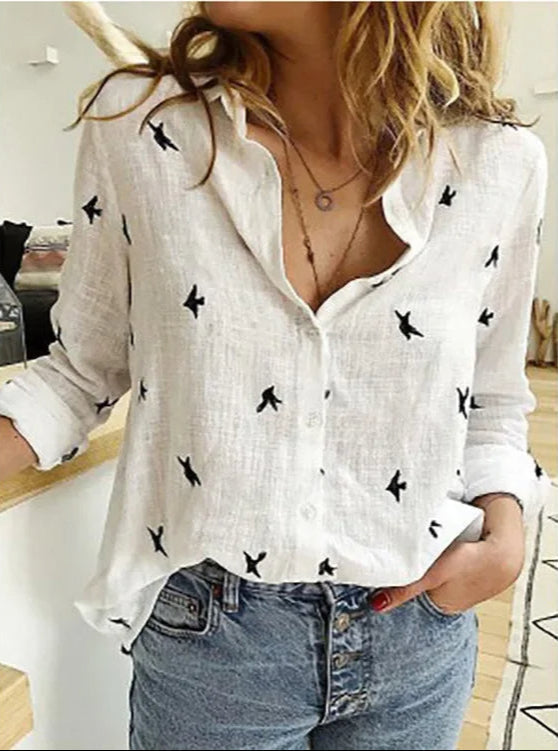 Elegant vintage floral blouse for women, featuring a loose fit and long sleeves, ideal for stylish casual outfits.
