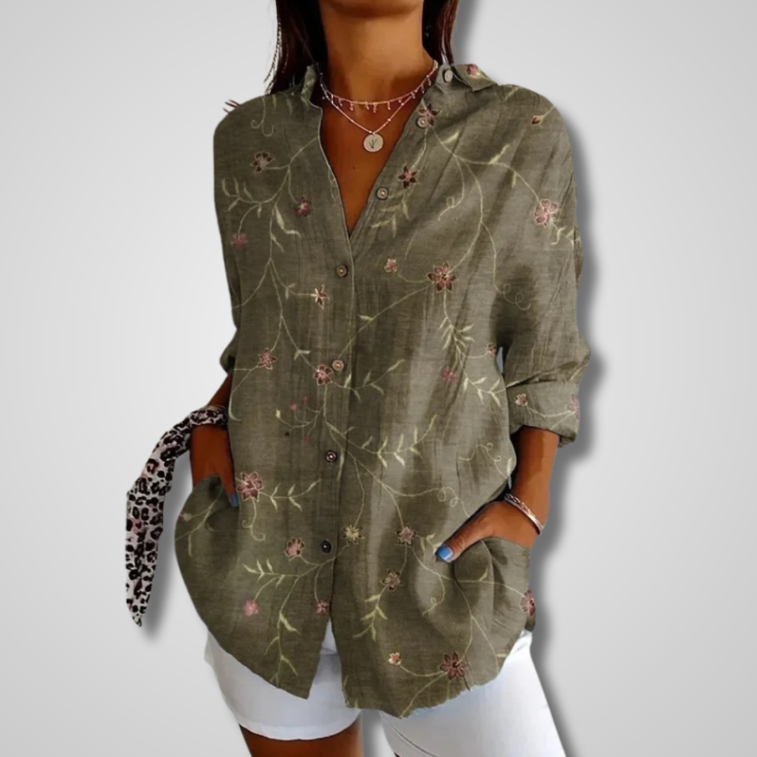Fashionable women's long sleeve v-neck blouse. Casual button-down top with a unique vintage print.