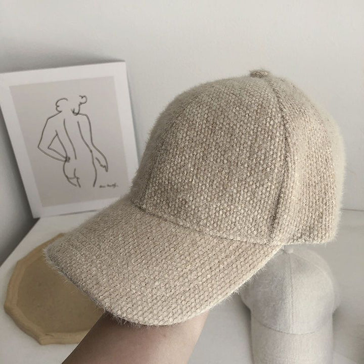 Women's warm faux fur baseball cap, perfect for autumn & winter style and comfort.