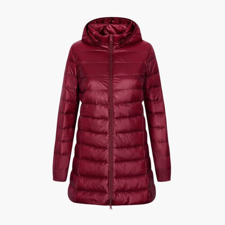 Quilted women's long hooded winter coat, perfect for casual wear & cold weather.