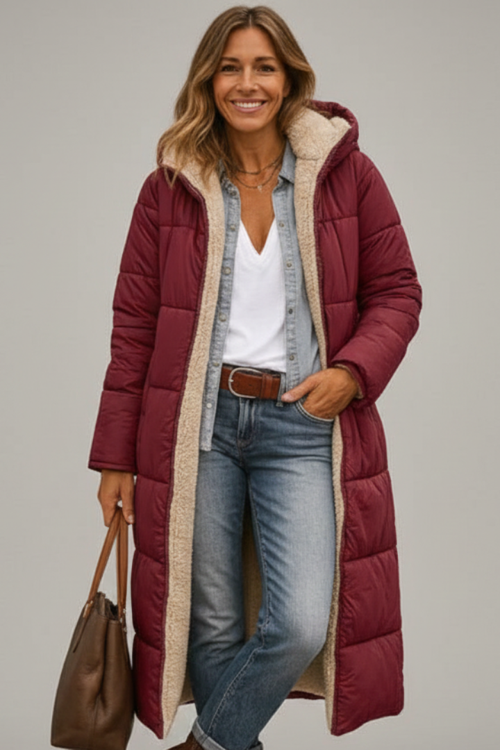 Chic women's long quilted hooded coat, full-zip, a must-have warm outerwear piece for winter fashion.