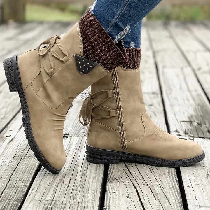 Stylish women's warm winter boots, weatherproof & slip-resistant, designed for comfort in cold weather & snow.