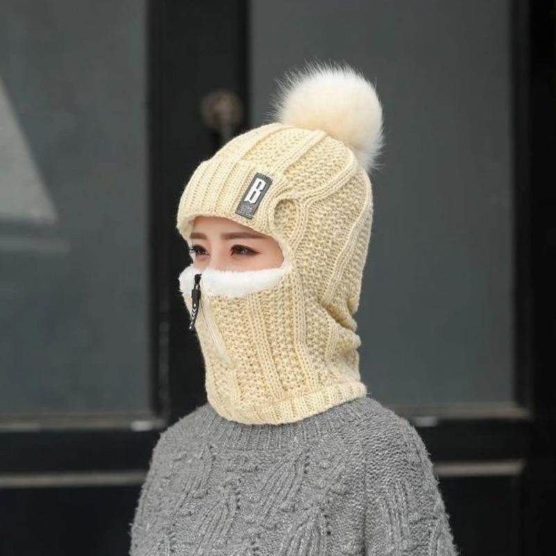 Overhead shot of a women's knit hat, emphasizing its warm, windproof, and comfortable design