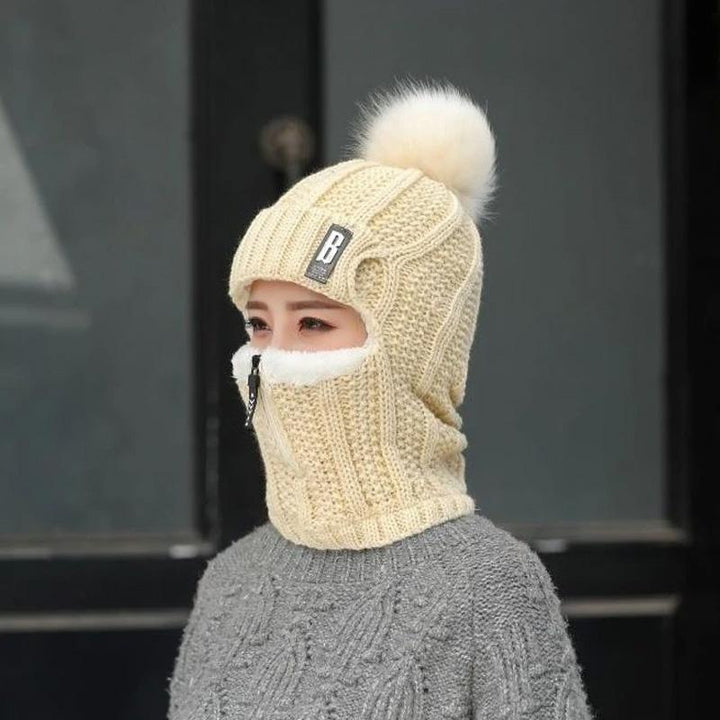 Overhead shot of a women's knit hat, emphasizing its warm, windproof, and comfortable design