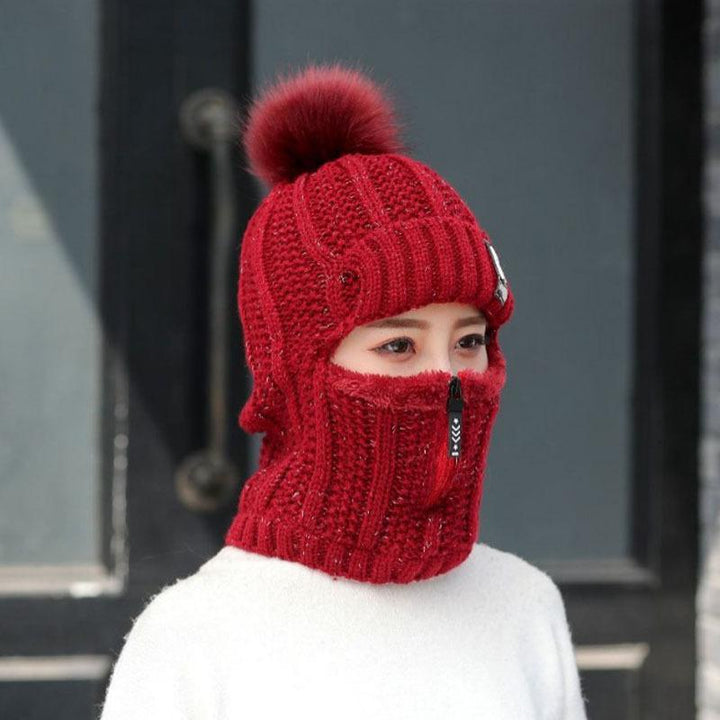 Close-up of the texture of a women's windproof winter hat, showing knit detail and warmth