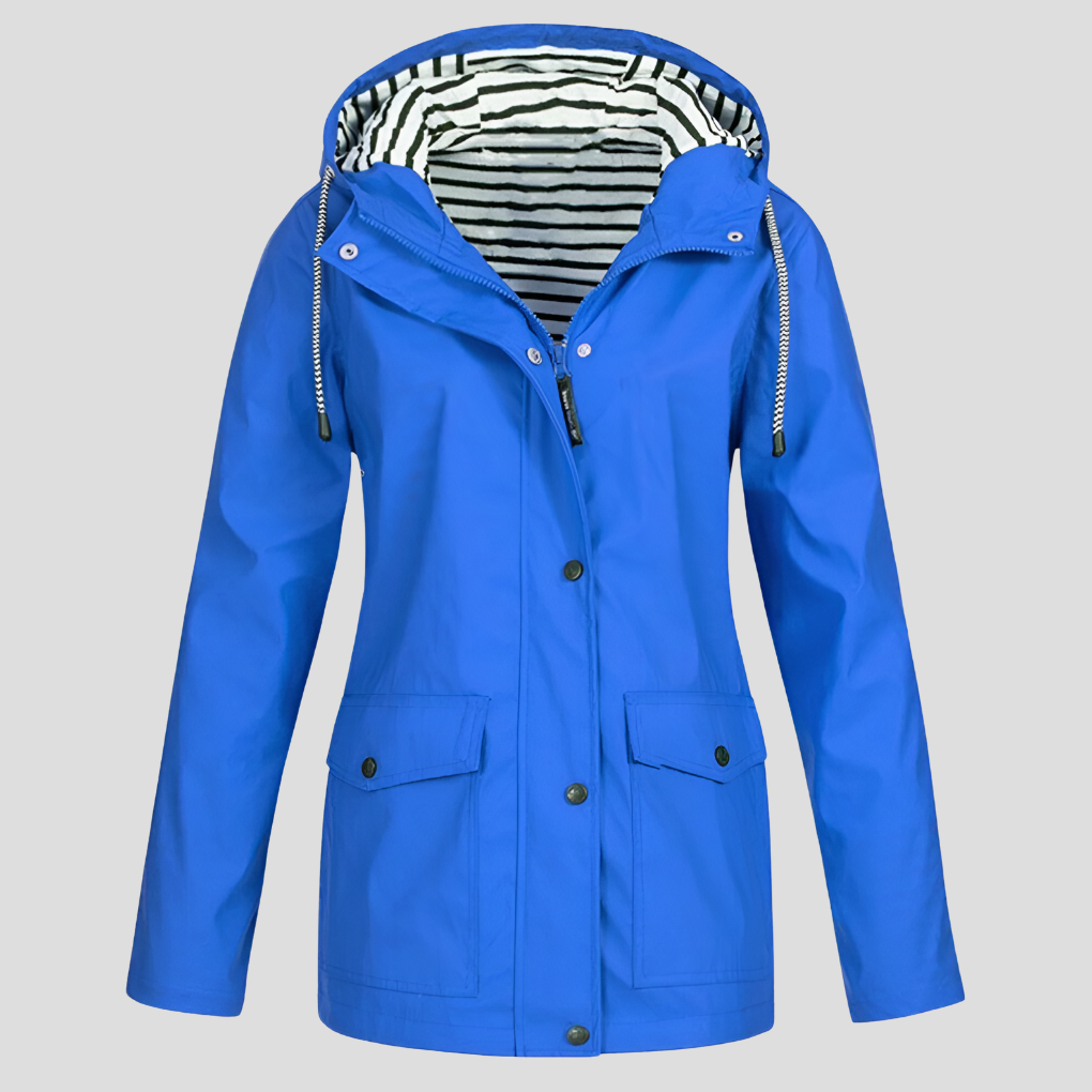 Close-up of a women's waterproof hooded jacket, highlighting the secure front pockets & adjustable hood.