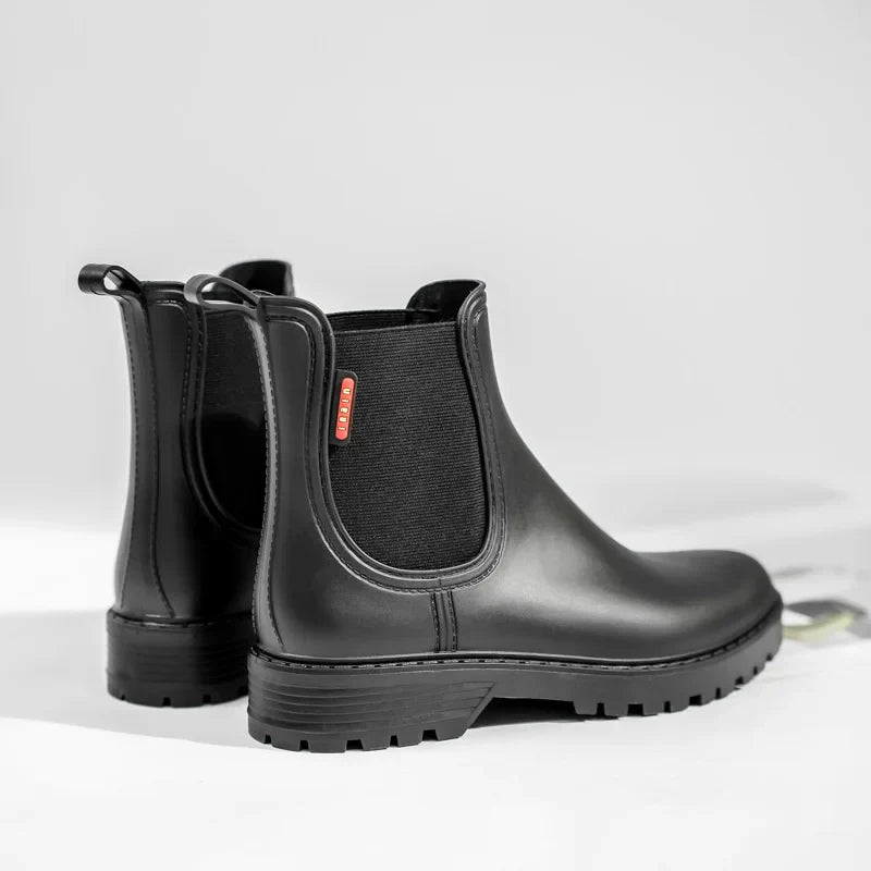 Cold weather ready: Women's black insulated Chelsea boots with waterproof protection.