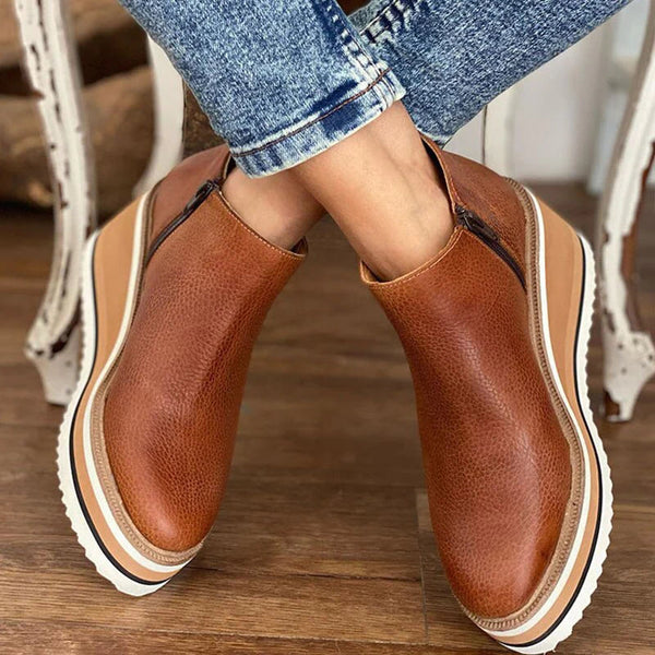 Waterproof women's ankle boots designed for orthopedic comfort, durable and perfect for fall and winter.