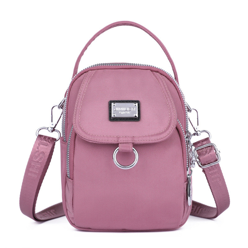 Women's waterproof crossbody bag with ample storage, perfect for active women