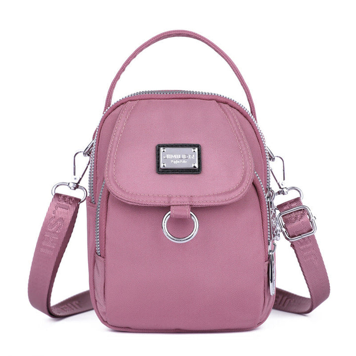 Women's waterproof crossbody bag with ample storage, perfect for active women