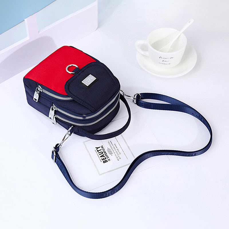 Close-up of women's waterproof crossbody bag texture, durable oxford fabric