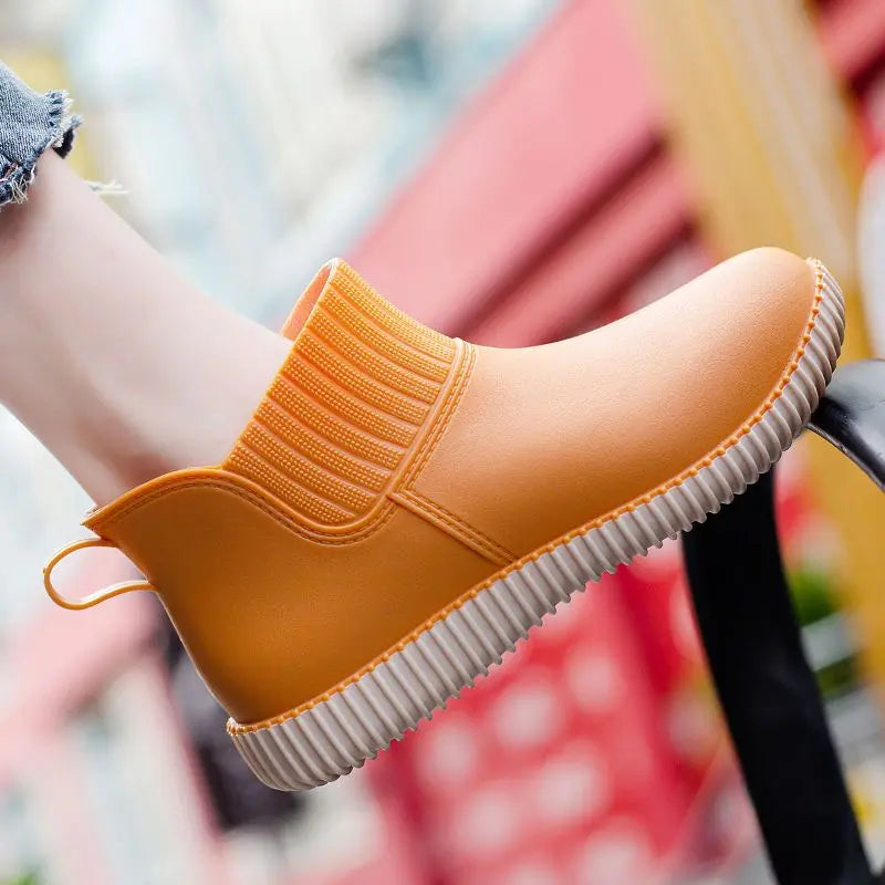 Women's Liora waterproof rain ankle boots, knitted comfort, non-slip sole & stylish sneaker-like design.
