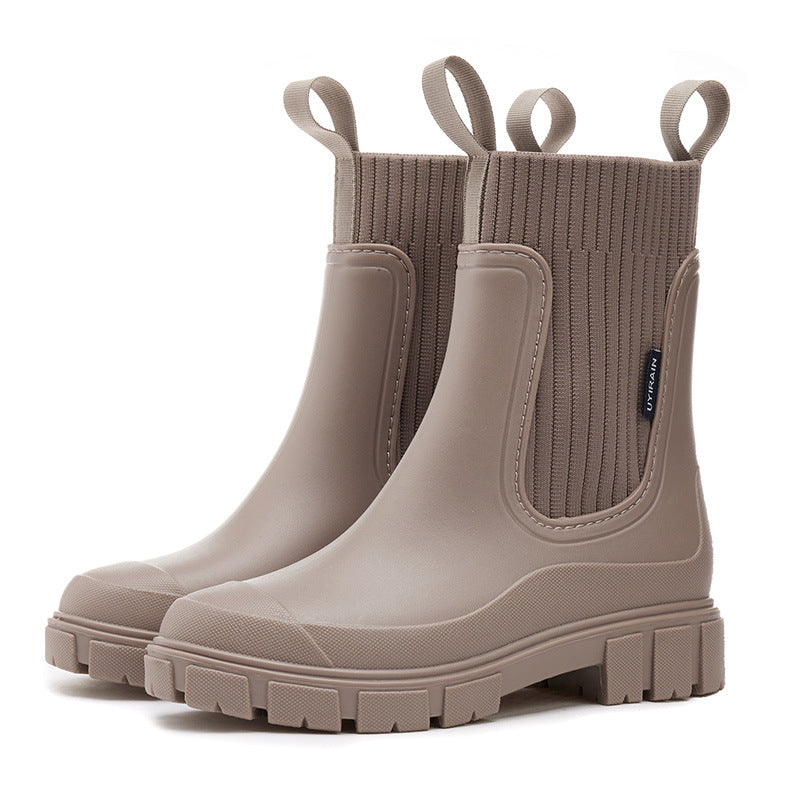 Ladies' durable rain boots, waterproof, thick tread sole, comfortable for autumn/winter outdoors.