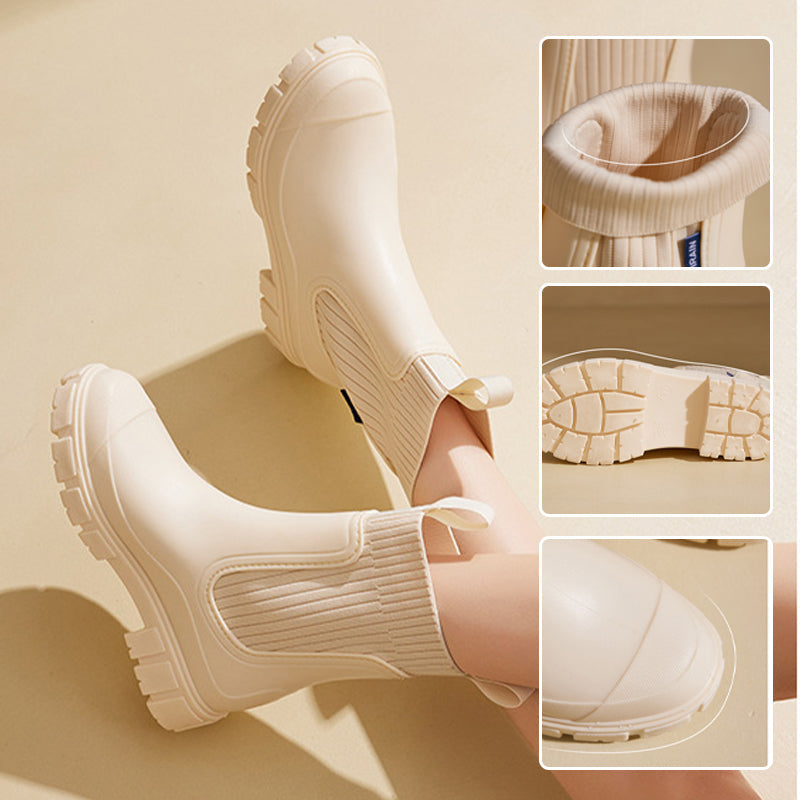Stylish ladies' waterproof rain boots, anti-slip thick sole, perfect for wet weather & puddles.