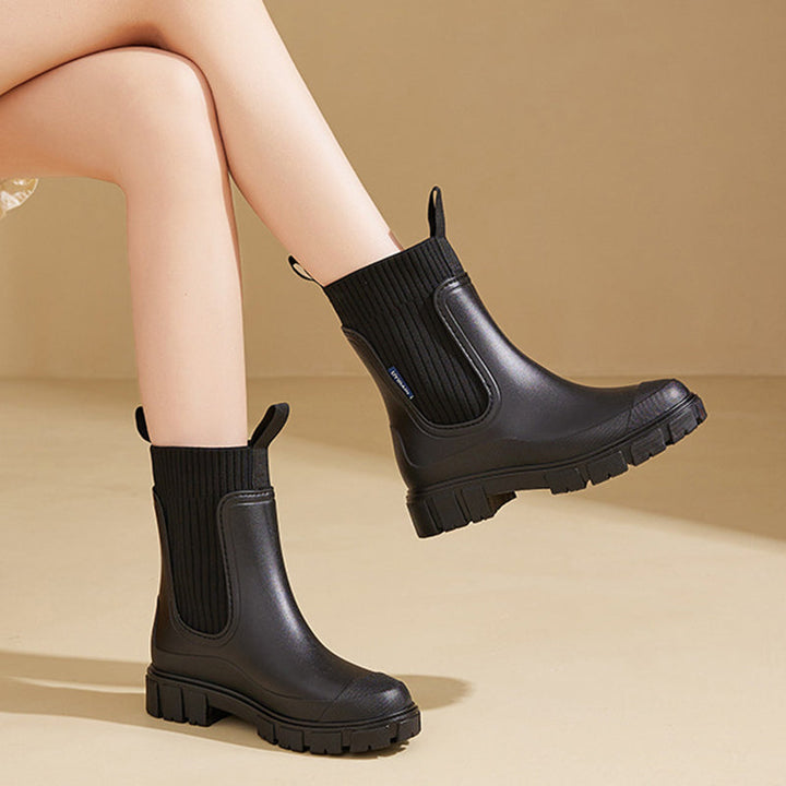 Durable women's autumn & winter rain boots with thick anti-slip sole for outdoor comfort.